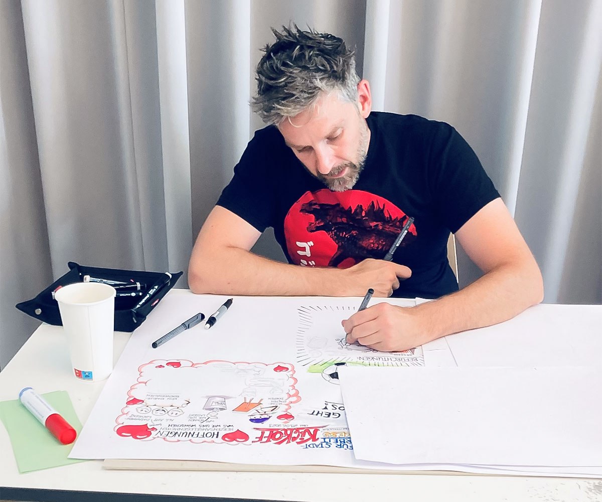 Person working on visual diagrams and charts